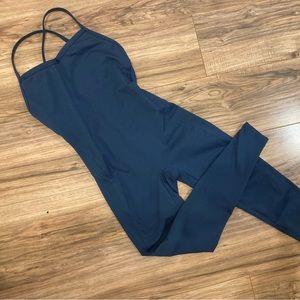 BOMBSHELL SPORTSWEAR one piece work out wear. FLAWLESS